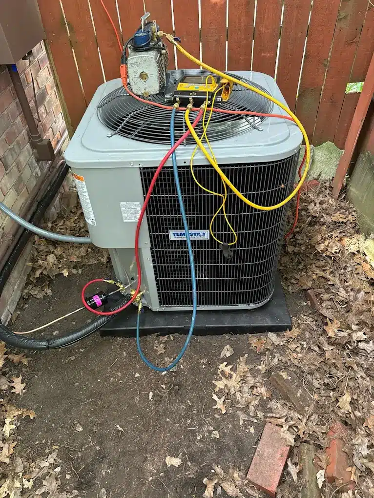 HVAC diagnostic gauges connected during an air conditioner repair