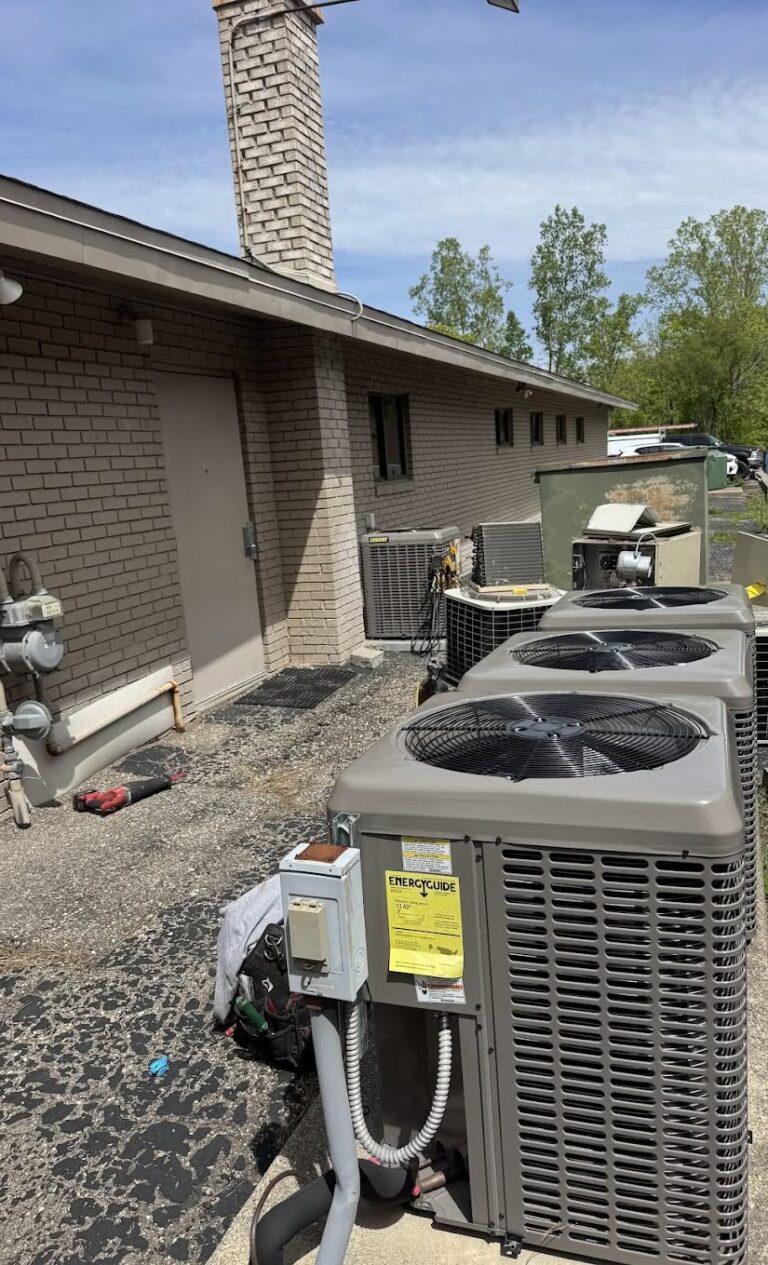Multiple outdoor HVAC condensers at a Michigan property